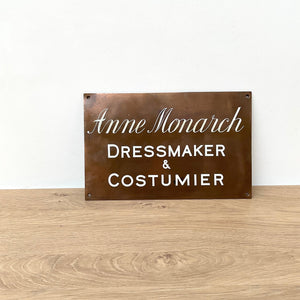 Antique Bronze Trade Sign "Dressmaker & Costumier"