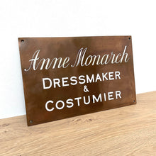 Load image into Gallery viewer, Antique Bronze Trade Sign &quot;Dressmaker &amp; Costumier&quot;
