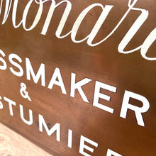 Load image into Gallery viewer, Antique Bronze Trade Sign &quot;Dressmaker &amp; Costumier&quot;
