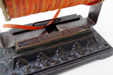 Load image into Gallery viewer, P. P. Payne &amp; Sons Cast Iron Shop Ribbon Dispenser c.1920
