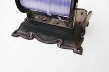 Load image into Gallery viewer, Vintage Cast Iron Shop Ribbon Dispenser
