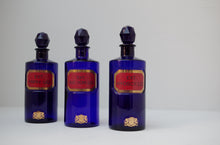 Load image into Gallery viewer, Set of Three Early 20th Century Apothecary Bottles (Blue Glass)
