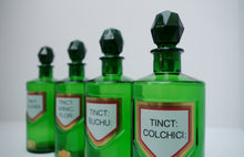 Load image into Gallery viewer, Set of Four Early 20th Century Apothecary Bottles (Green Glass)
