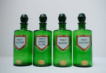 Load image into Gallery viewer, Set of Four Early 20th Century Apothecary Bottles (Green Glass)
